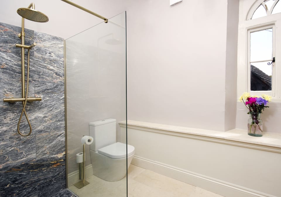 Deluxe House | Bathroom | Hair dryer, soap