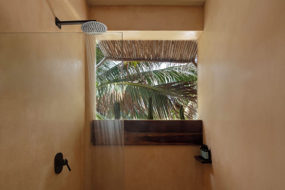 Honeymoon Room, 1 King Bed, Partial Ocean View, Beachside | Bathroom | Shower, free toiletries, hair dryer, towels