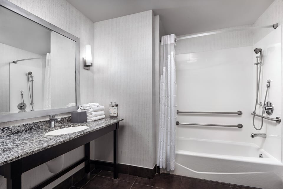 Eco-friendly toiletries, hair dryer, towels, soap