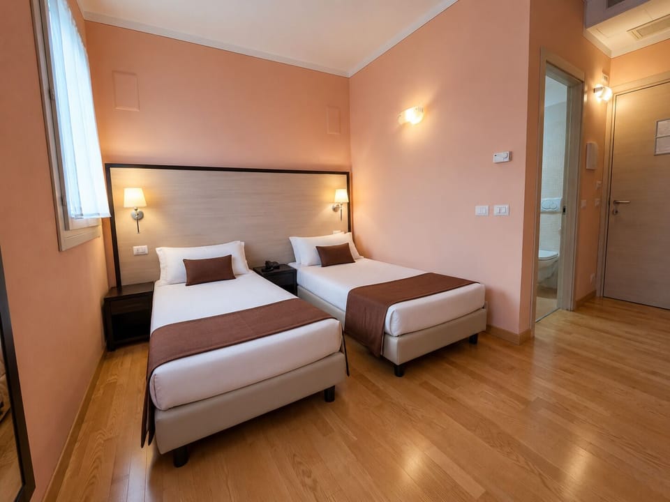 Basic Room | 1 bedroom, down comforters, Tempur-Pedic beds, in-room safe