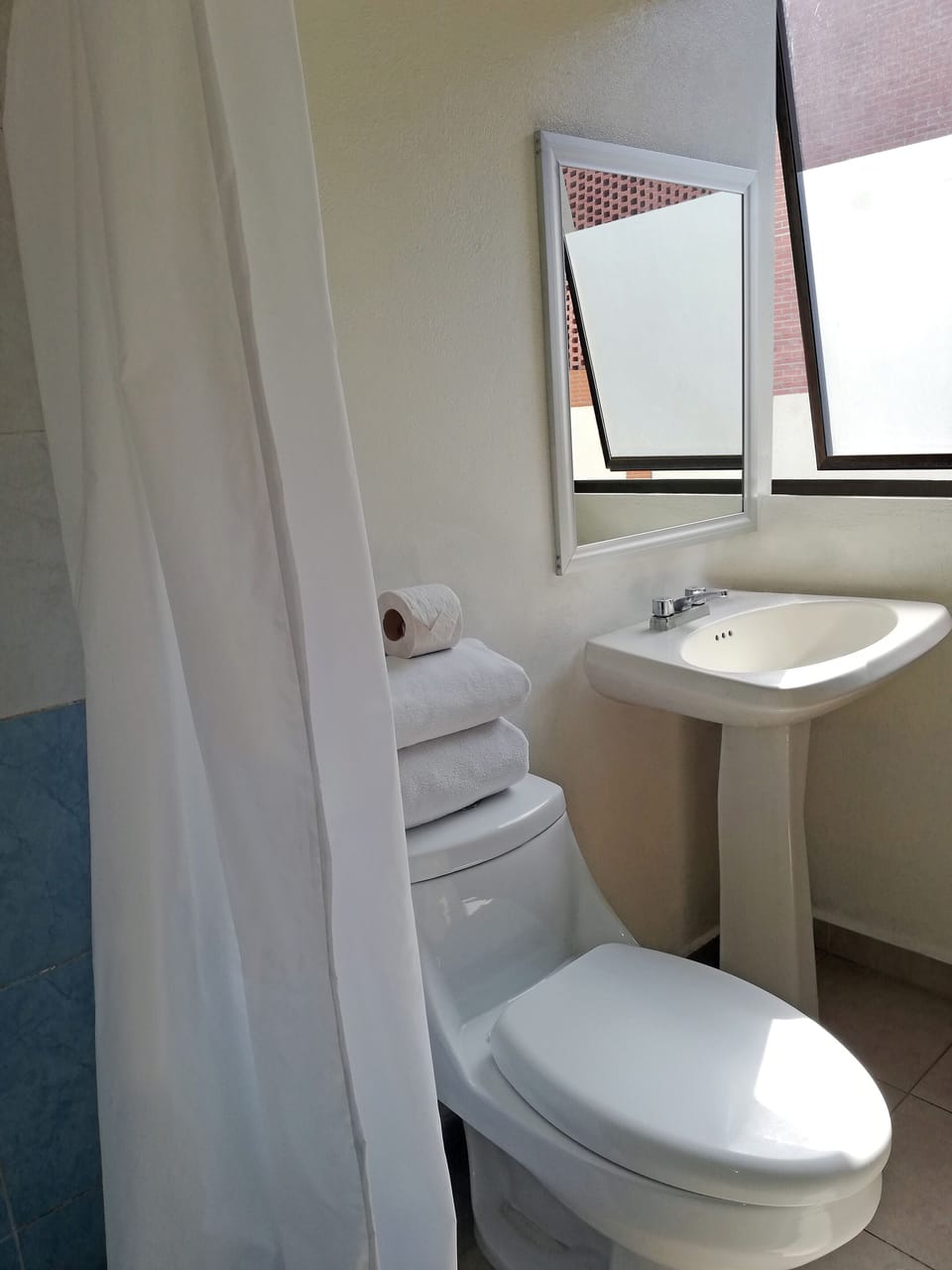 Basic Single Room | Bathroom | Shower, free toiletries, towels, soap