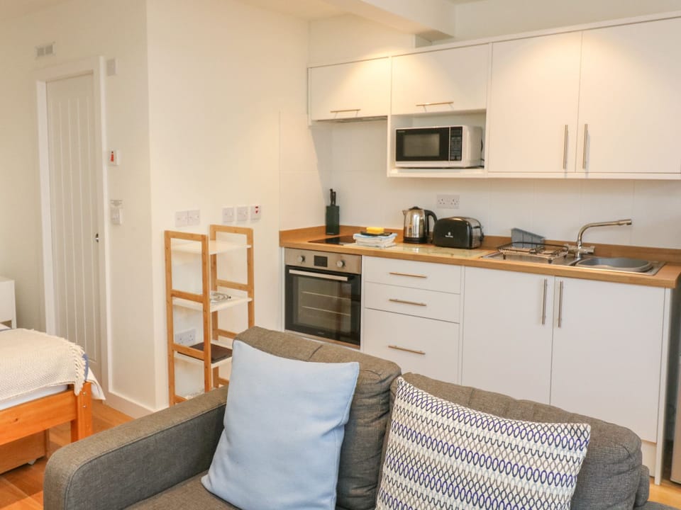 Fridge, toaster, cookware/dishes/utensils