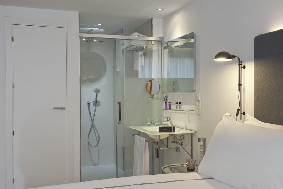 Eco-friendly toiletries, hair dryer, towels
