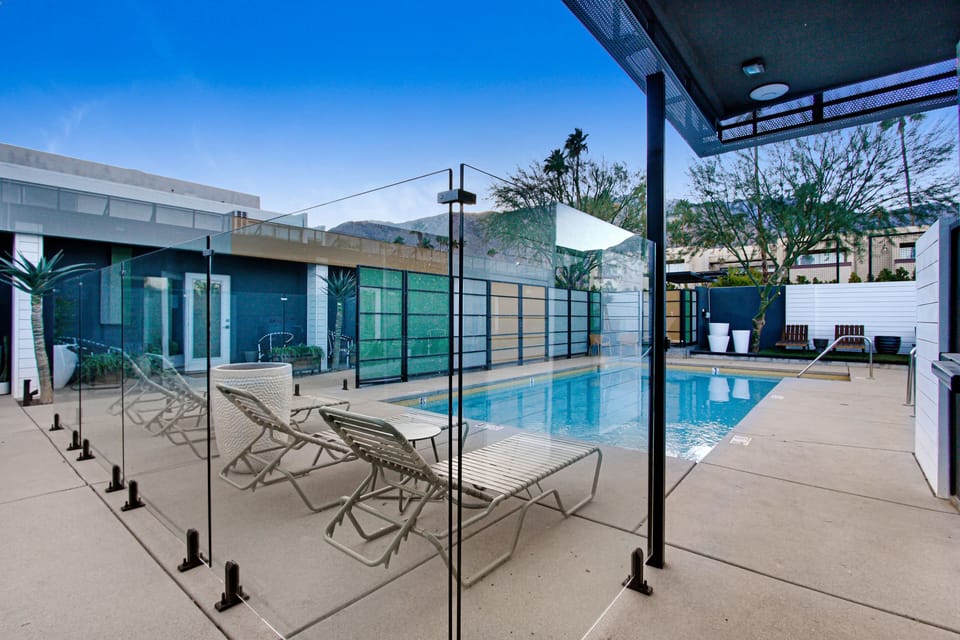 Outdoor pool, pool umbrellas, sun loungers