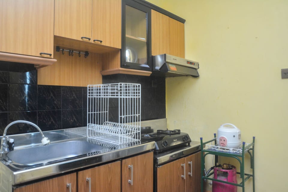 Apartment, 2 Bedrooms | Private kitchen | Fridge, stovetop, cookware/dishes/utensils