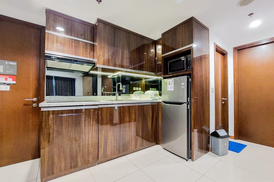 Apartment, 2 Bedrooms | Private kitchen | Fridge, stovetop, electric kettle, cookware/dishes/utensils