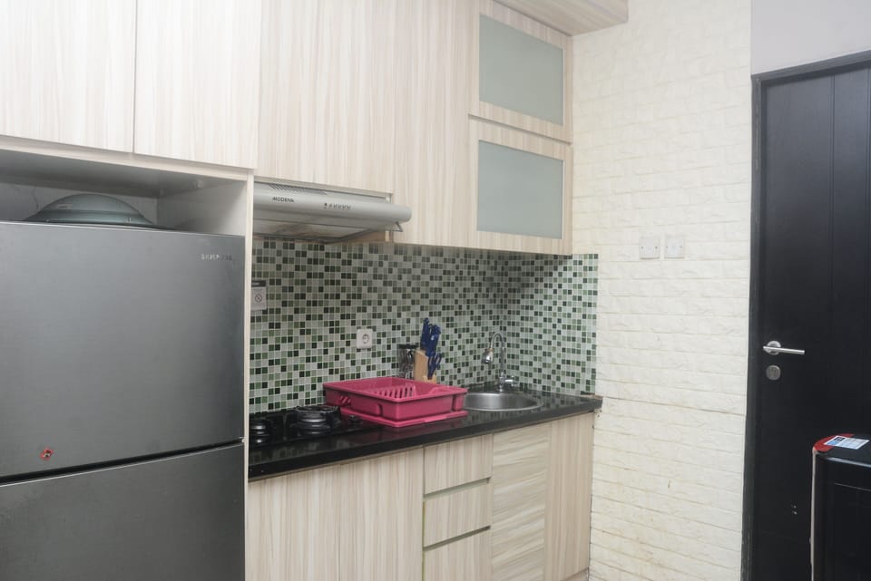 Apartment, 2 Bedrooms | Private kitchen | Fridge, stovetop, electric kettle, cookware/dishes/utensils