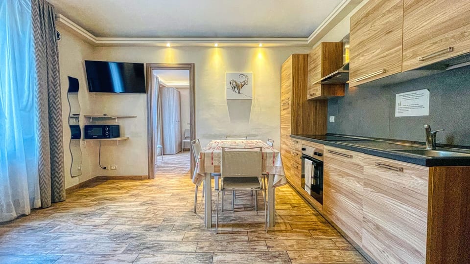 Superior Apartment, 1 Bedroom, Terrace (5 people) | Living area | 70-cm flat-screen TV with digital channels, TV