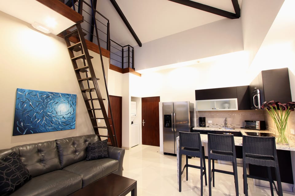 1BR DUPLEX LOFT W/Kitchen, Living room, Loft, 3 balconies | Living area | 40-inch flat-screen TV with digital channels, TV