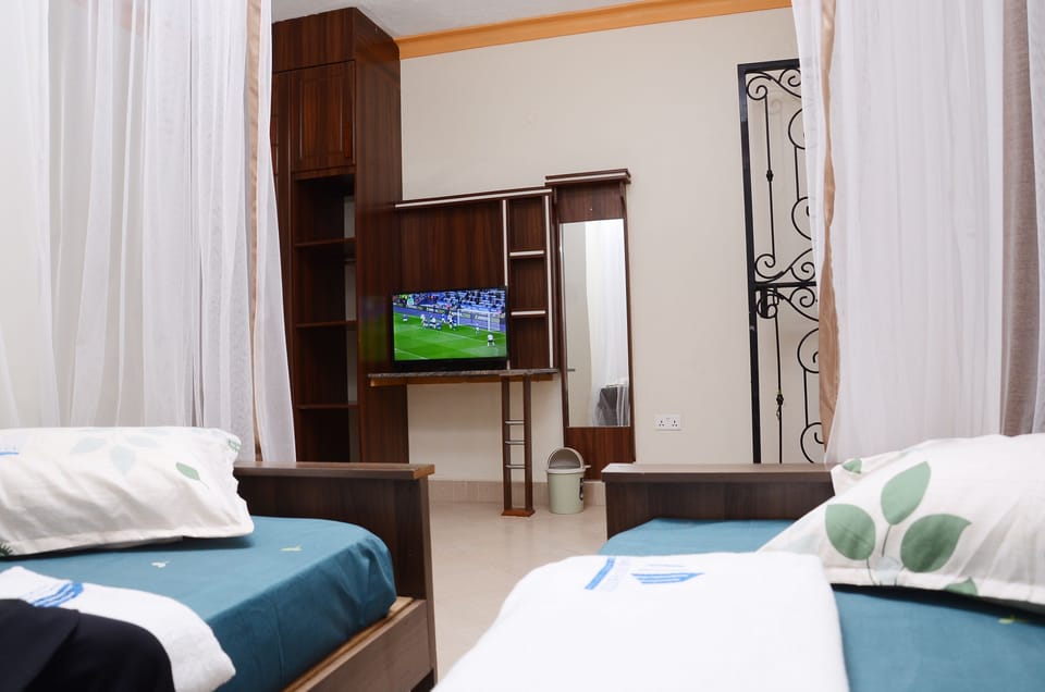 Twin Room | Premium bedding, memory foam beds, individually decorated