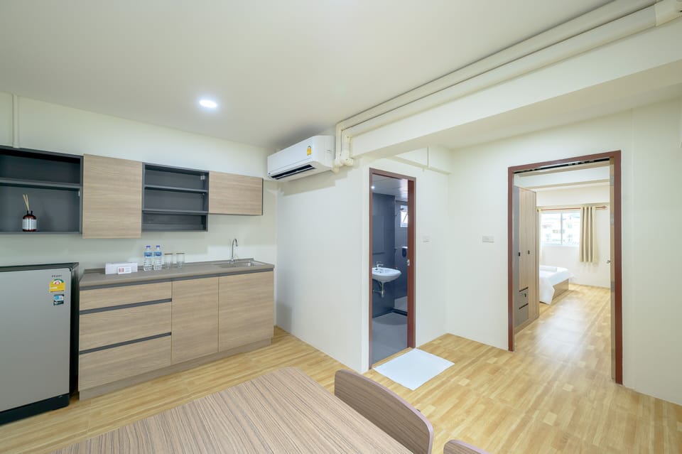 Exclusive Room | Living area | Flat-screen TV