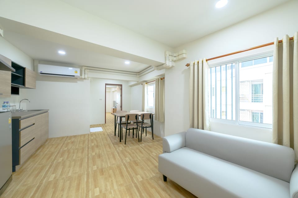 Exclusive Room | Living area | Flat-screen TV