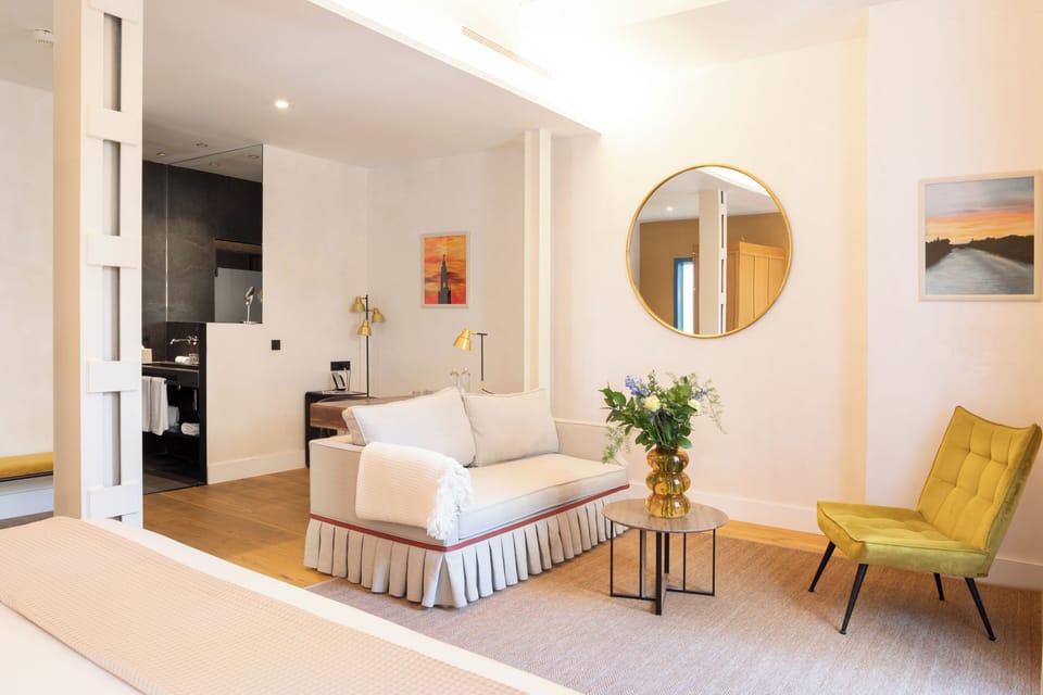 Junior Suite | Living area | 55-inch Smart TV with digital channels, TV