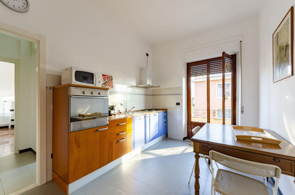 Apartment, 3 Bedrooms, Balcony, City View | Private kitchen | Espresso maker, dining tables