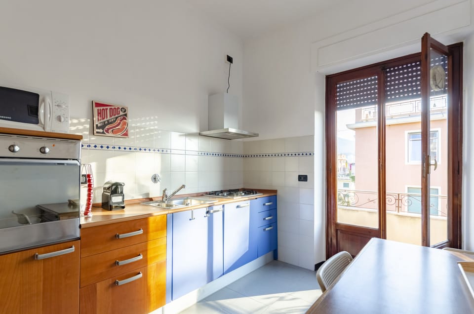 Apartment, 3 Bedrooms, Balcony, City View | Private kitchen | Espresso maker, dining tables