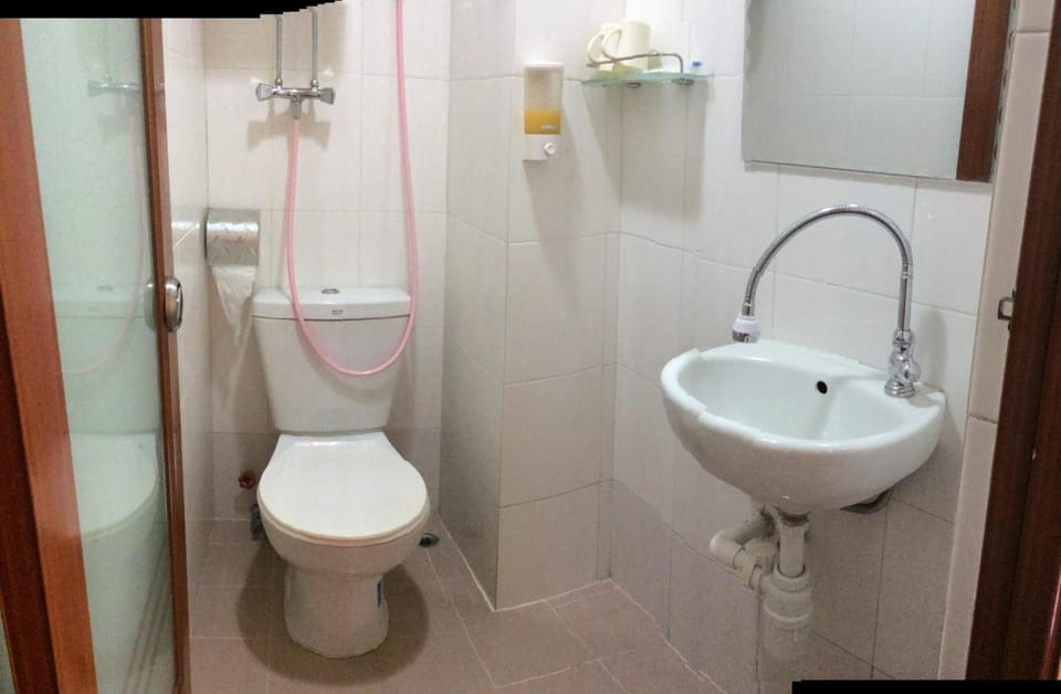Shower, free toiletries, hair dryer, slippers