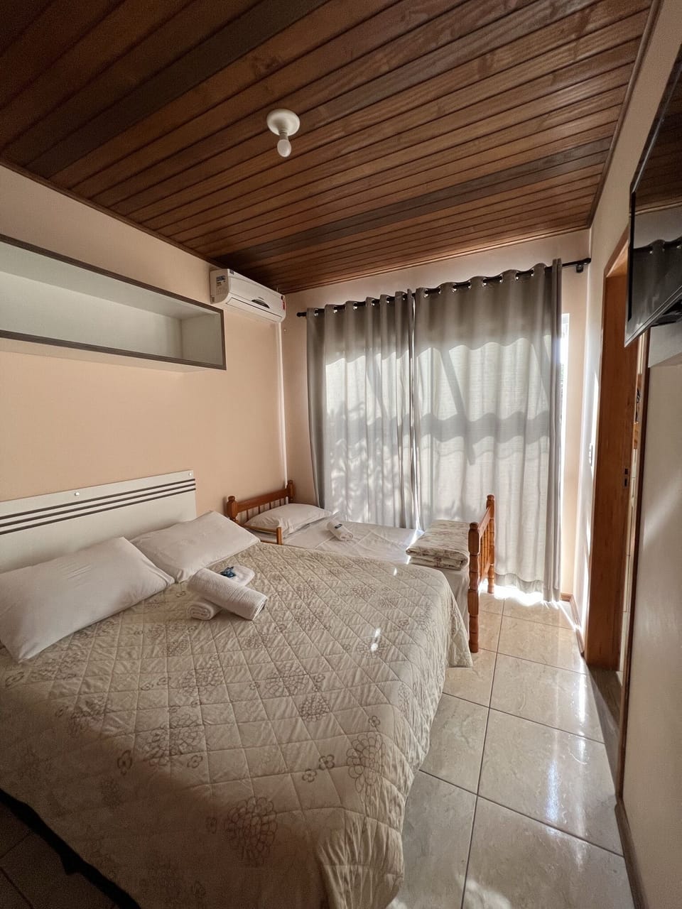 Triple Room | Blackout drapes, iron/ironing board, free WiFi