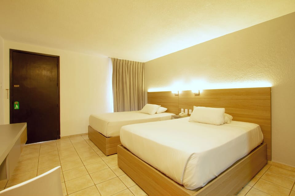 Desk, laptop workspace, free WiFi, bed sheets