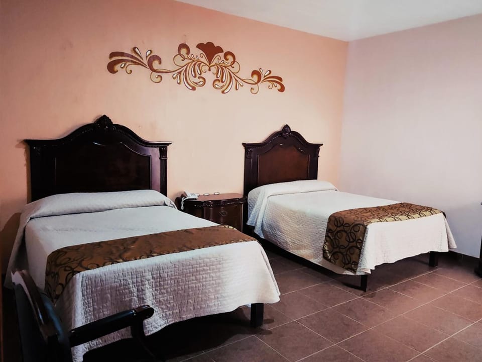 Quadruple Room | Individually furnished, iron/ironing board, free WiFi