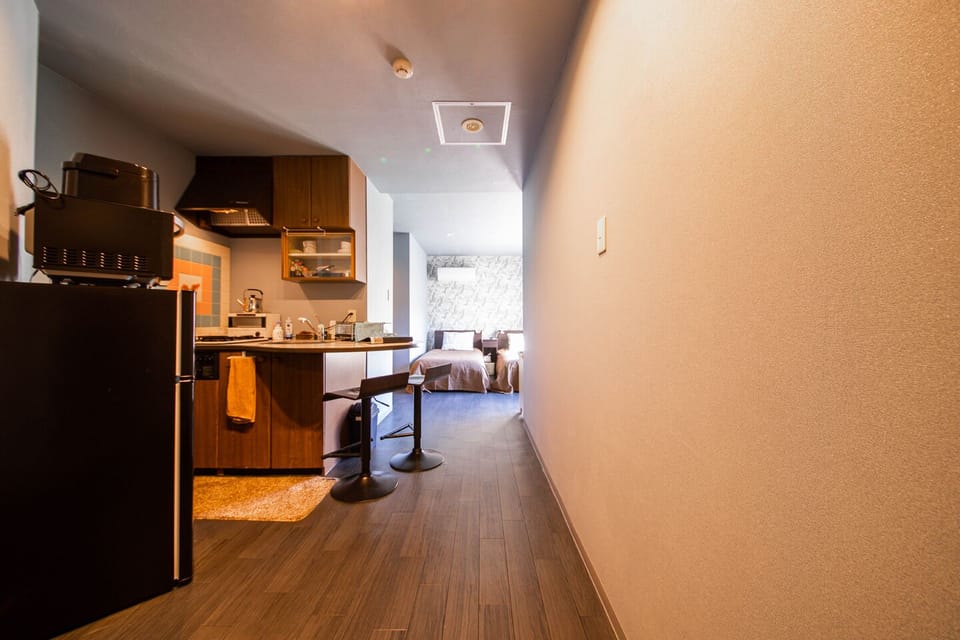 Twin Room | Blackout drapes, iron/ironing board, WiFi (free)