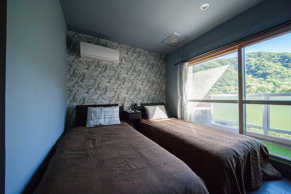 Twin Room | Blackout drapes, iron/ironing board, WiFi (free)