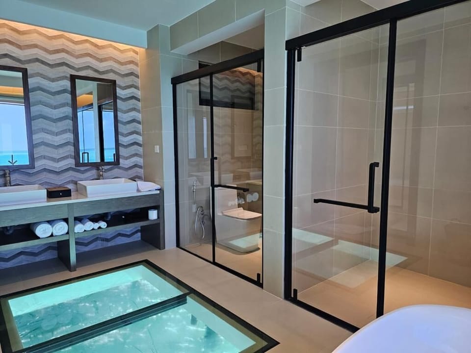 Grand Atlantis - Two Bedroom Overwater Villa with Private Pool | Bathroom | Separate tub and shower, free toiletries, hair dryer, bathrobes