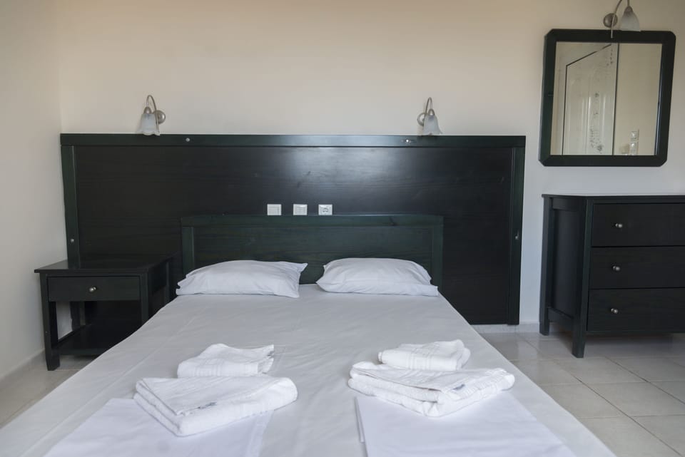 Iron/ironing board, travel crib, free WiFi, bed sheets