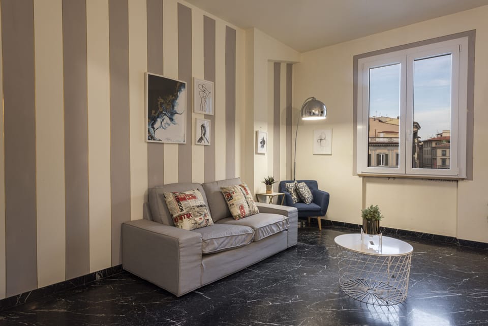 Deluxe Apartment | Living area | 40-inch flat-screen TV with digital channels, TV