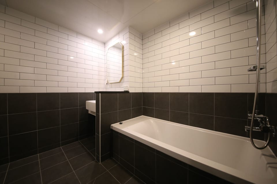 Standard Room | Bathroom | Free toiletries, hair dryer, bathrobes, slippers
