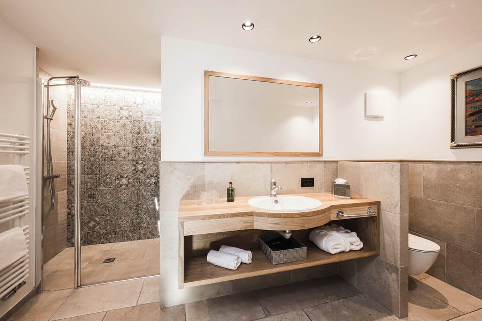 Panoramic Studio Suite | Bathroom | Hair dryer, bathrobes, slippers, bidet