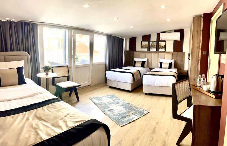 Family Triple Room | Premium bedding, Select Comfort beds, in-room safe, desk