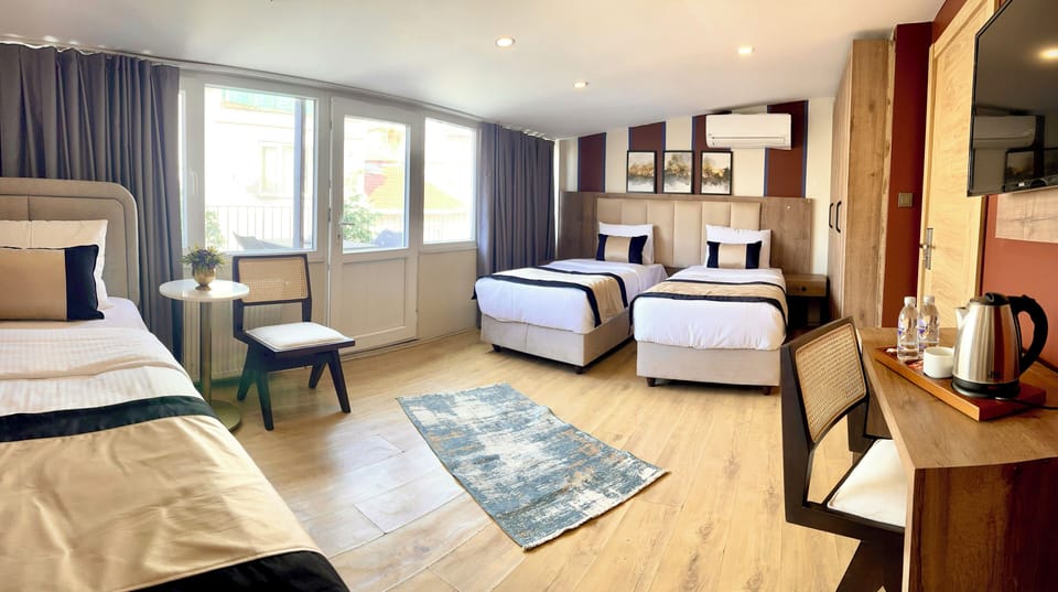 Family Triple Room | Premium bedding, Select Comfort beds, in-room safe, desk