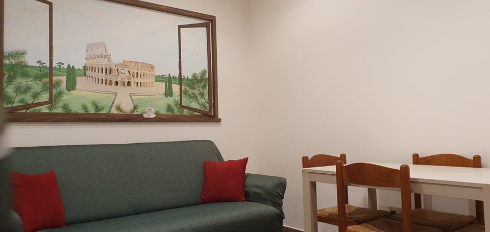 City Apartment | Living area | 32-inch flat-screen TV with cable channels, TV