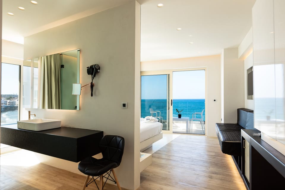 Junior Suite, Sea View | In-room safe, desk, soundproofing, iron/ironing board