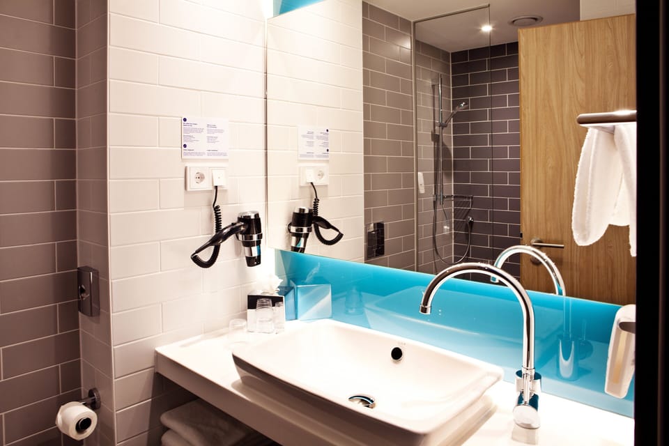 Shower, free toiletries, hair dryer, towels