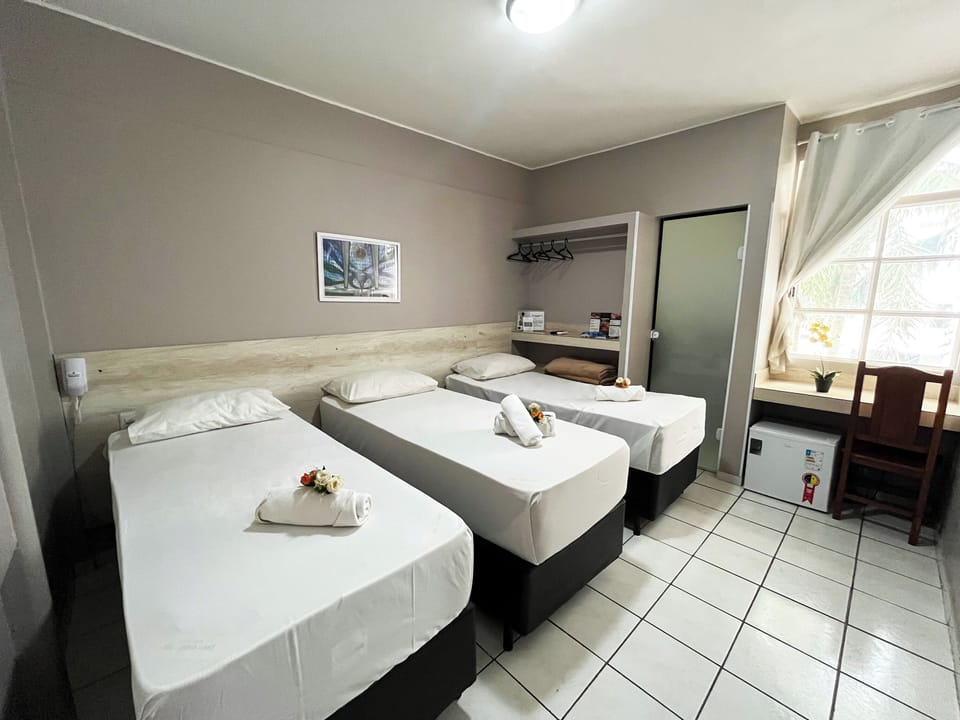 Standard Triple Room | Hypo-allergenic bedding, minibar, desk, soundproofing