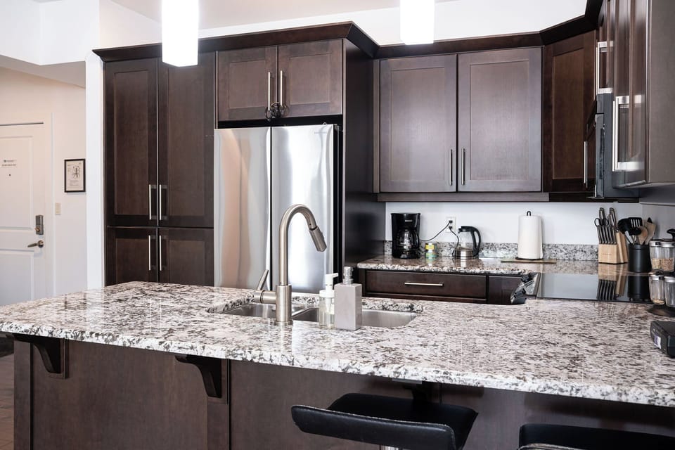 Condo | Private kitchen | Coffee/tea maker, full-size fridge, microwave, oven