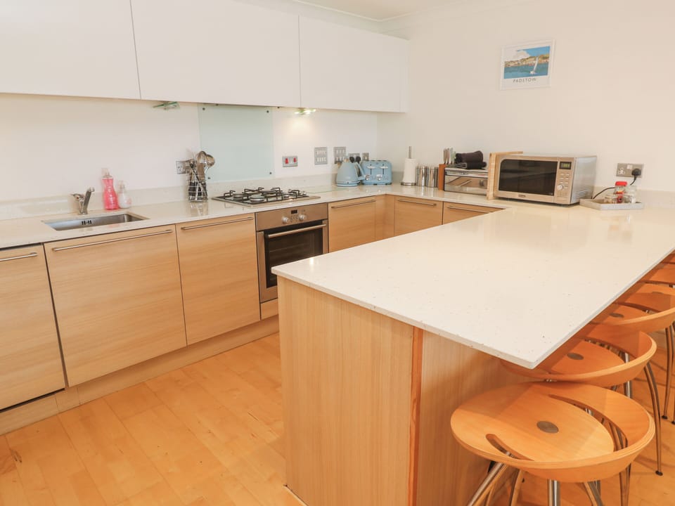 Fridge, electric kettle, toaster, cookware/dishes/utensils