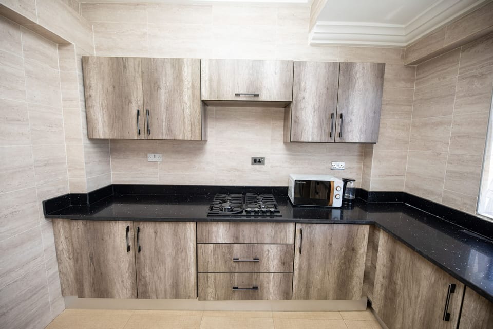 Apartment | Private kitchen | Fridge, microwave, oven, stovetop