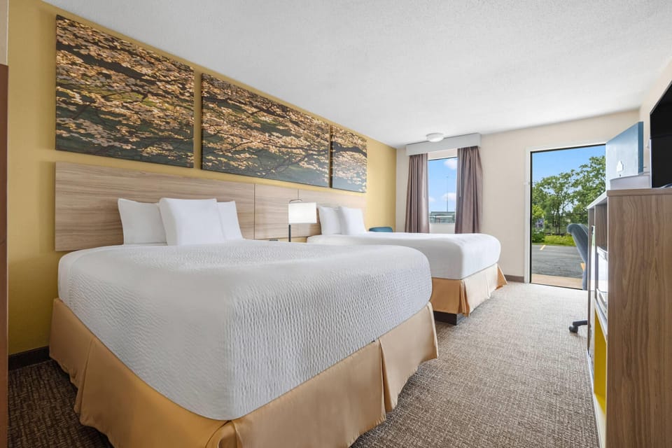 Room, 2 Queen Beds, Non Smoking | In-room safe, desk, blackout drapes, iron/ironing board