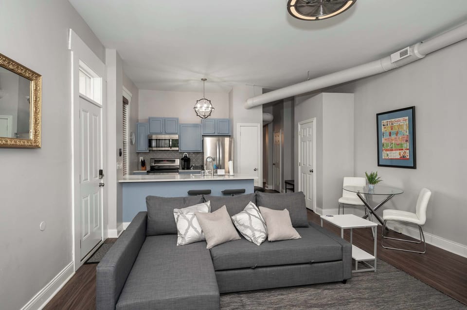 Condo, 2 Queen Beds, Kitchen | Living area | 40-inch TV with digital channels