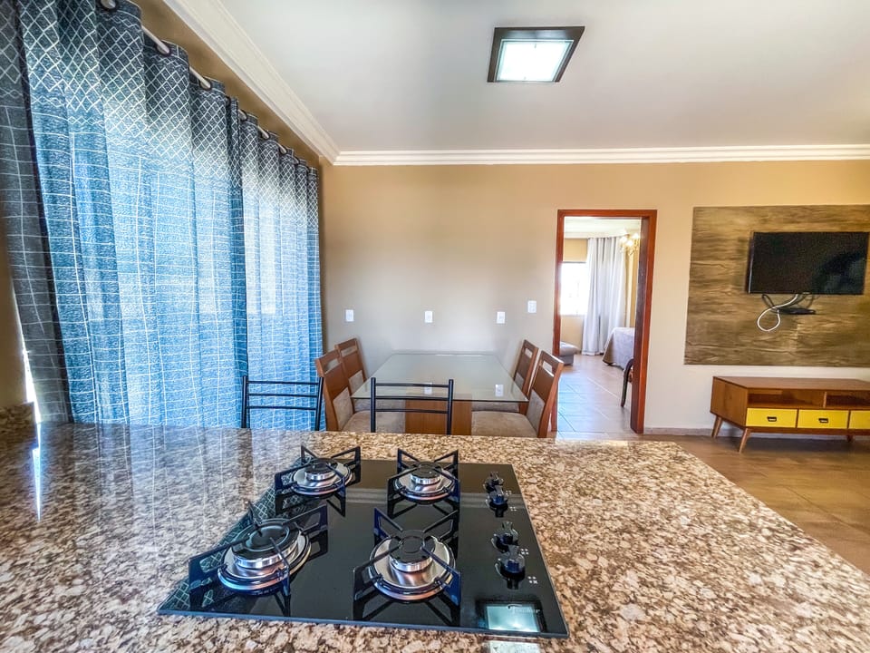 Deluxe Apartment | Private kitchen | Full-size fridge, microwave, stovetop, toaster oven