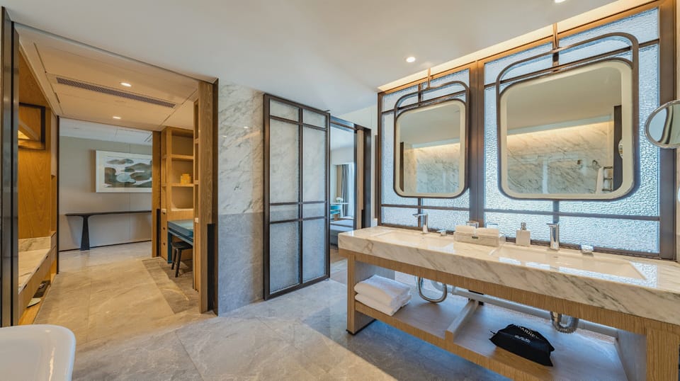 Suite, 1 Bedroom | Bathroom | Shower, hydromassage showerhead, designer toiletries, hair dryer