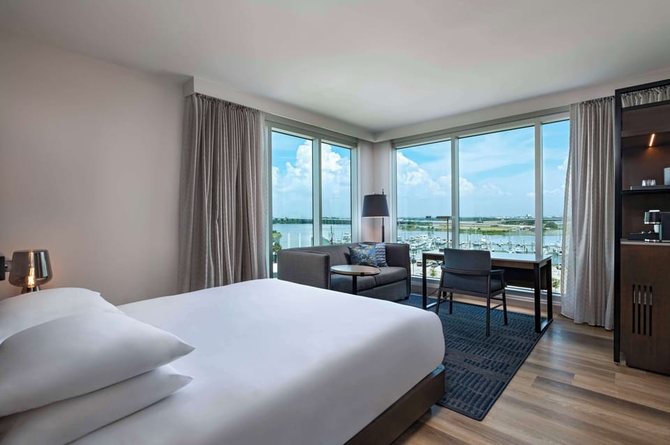 Room, 1 King Bed (Water View) | Down comforters, minibar, in-room safe, desk