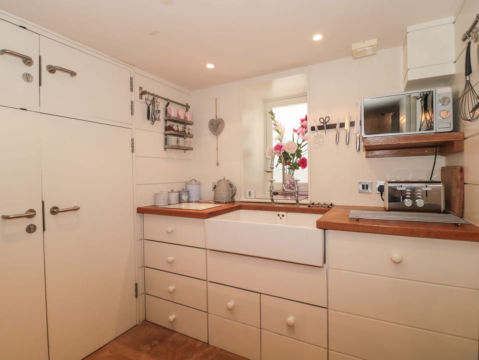 Fridge, electric kettle, toaster, cookware/dishes/utensils