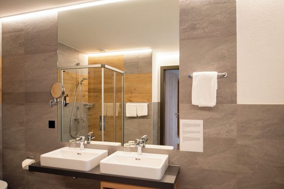 Rainfall showerhead, slippers, heated floors (bathroom), towels