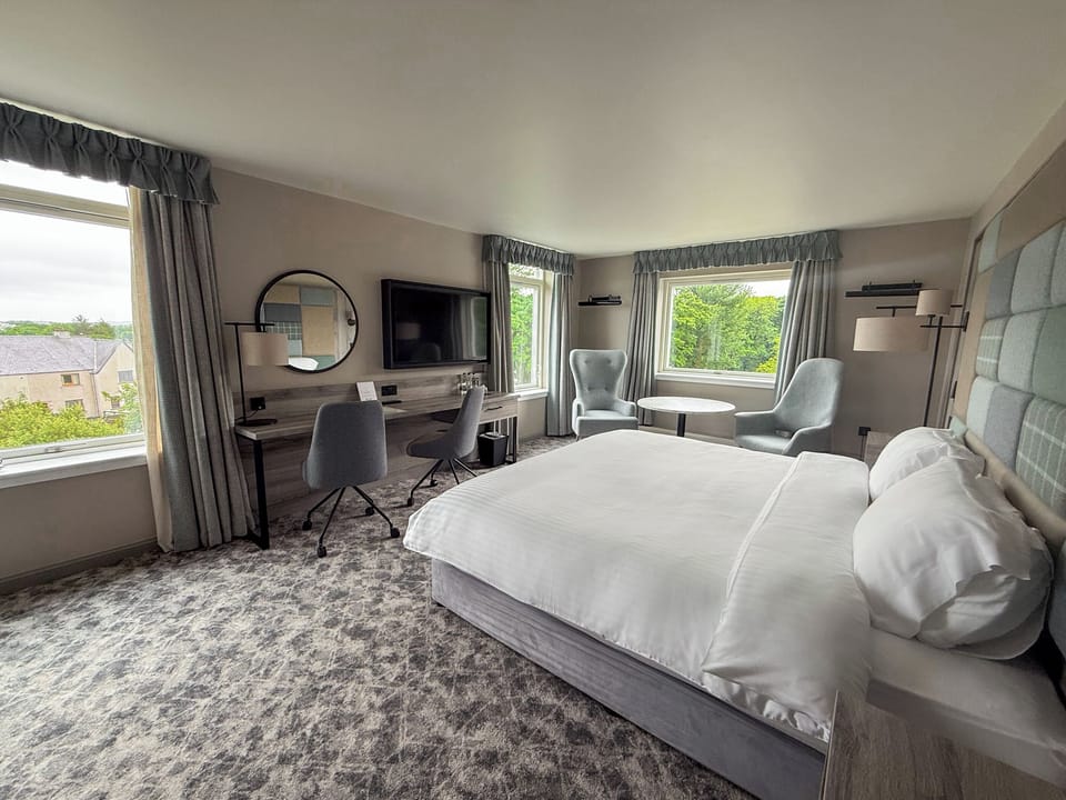Executive Double or Twin Room | Desk, blackout drapes, iron/ironing board, travel crib