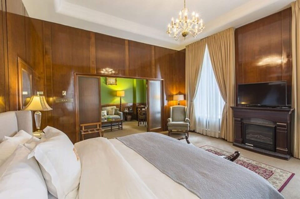 King Suite  | Premium bedding, down comforters, in-room safe, individually decorated