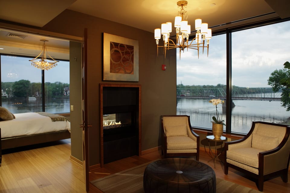 Riverview Suite with Stunning RiverViews | Living area | 50-inch flat-screen TV with cable channels, TV