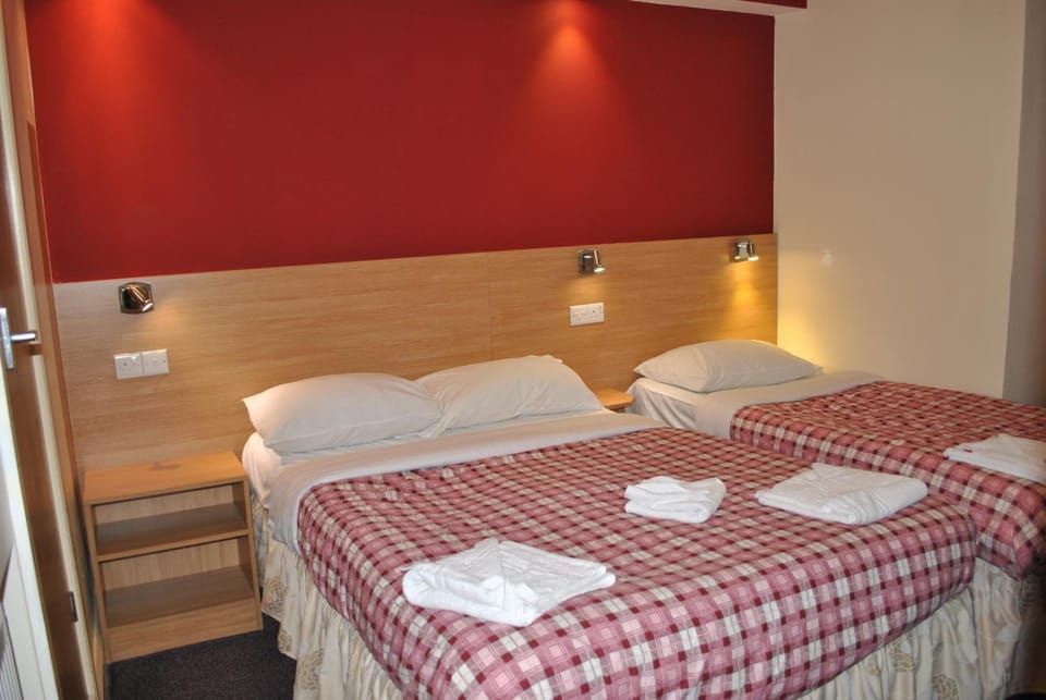 Pillowtop beds, in-room safe, desk, WiFi